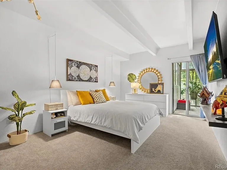 Main bedroom with view to sun porch