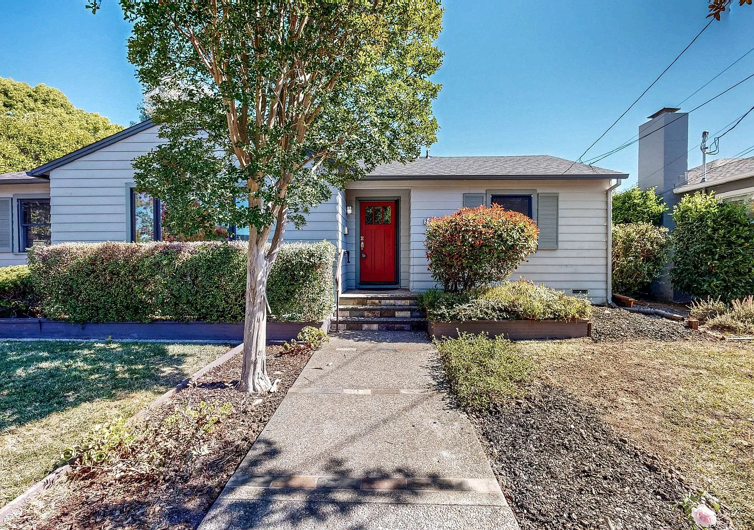 Bright & Cozy! Conveniently located Three Bedroom Two Bath Single Level with Detached Two Car Gar... — Photo 1