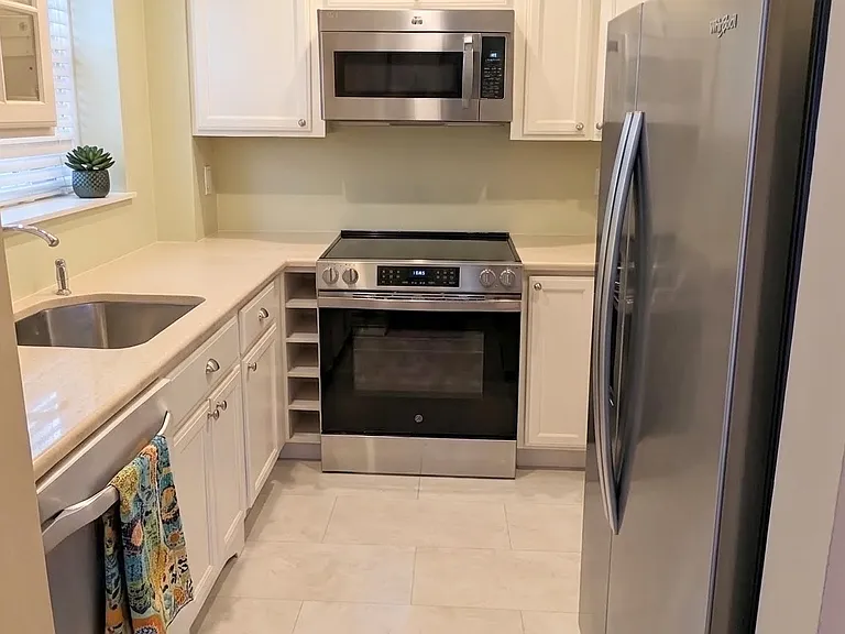 Airy Kitchen with Stainless Steel appliances