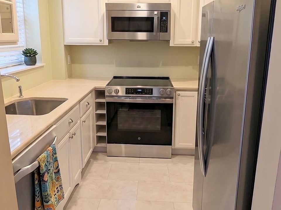Airy Kitchen with Stainless Steel appliances