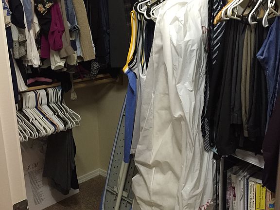 Master bedroom walk-in closet (new carpet!)