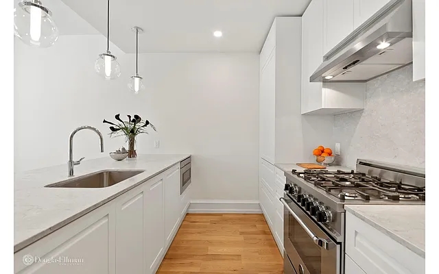 Sold by Douglas Elliman | media 18