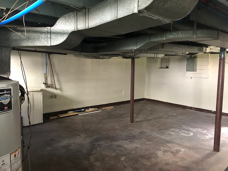 Basement with water heater and new furnace. W/D hookups as well.