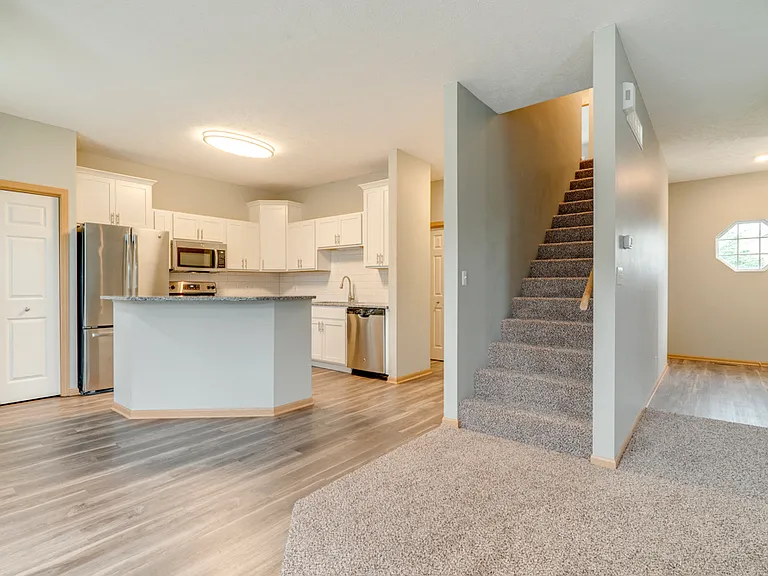 Welcome to Cascade Pines, where spacious townhomes feature modern kitchens, open layouts, and refined finishes.