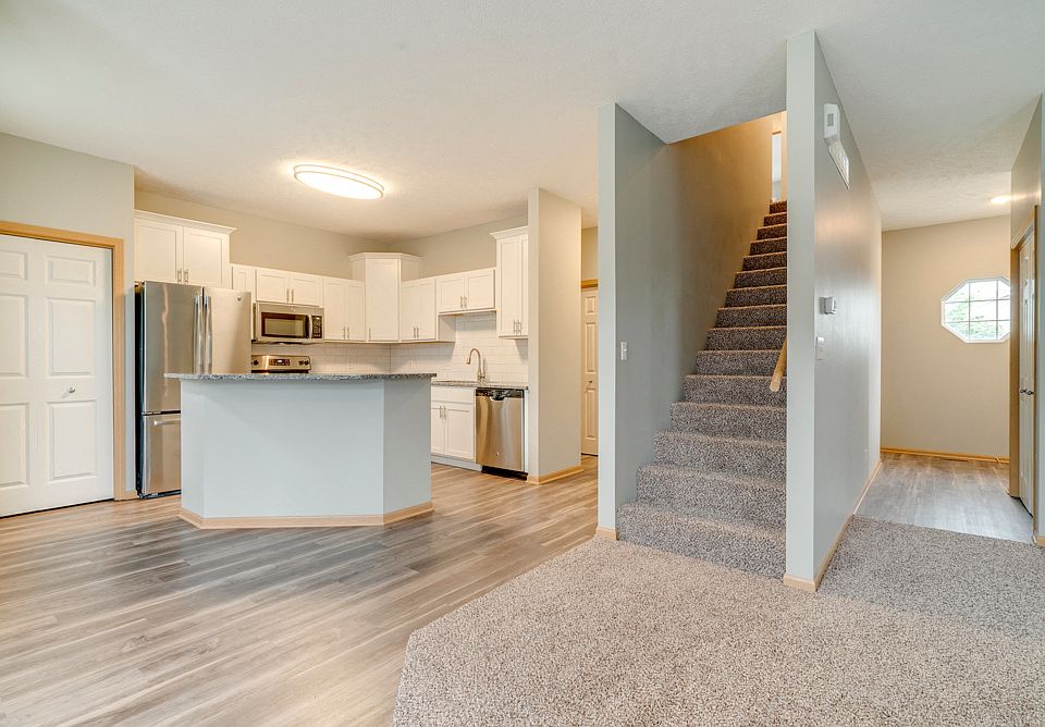 Renovated Tree Haven living area with upgraded kitchen, flooring, and more.