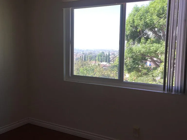 4th bedroom with view of yard