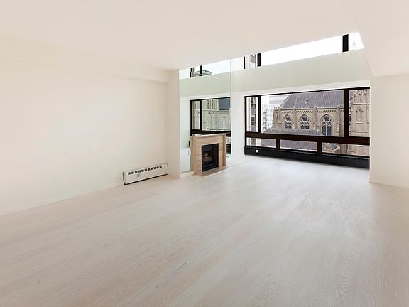 An elegant, modern and stylish unit with wide space, hardwood floors, and clean walls. There is also a built-in fire place, a full bathroom, and a wall-sized window that gives you a majestic view of the city.