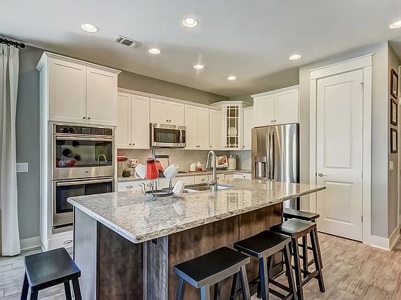 Kitchen with breakfast bar at island