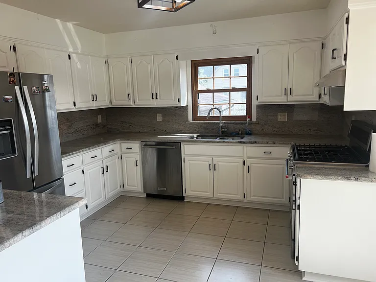 342 Suttons Ln — Photo 3