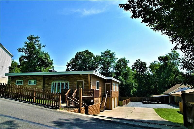 Welcome to 146 Wynne Street! A lovely, updated 3 bedroom ranch on .7 of a fabulous acre...  inground pool, custom built free sta