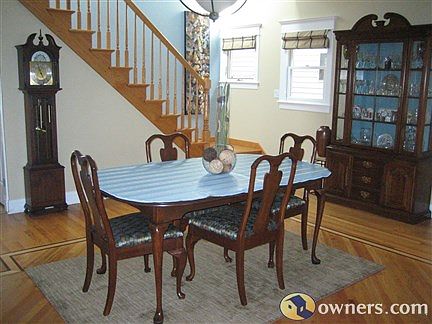 Formal Dining Room also features inlaid hardwood floors.
