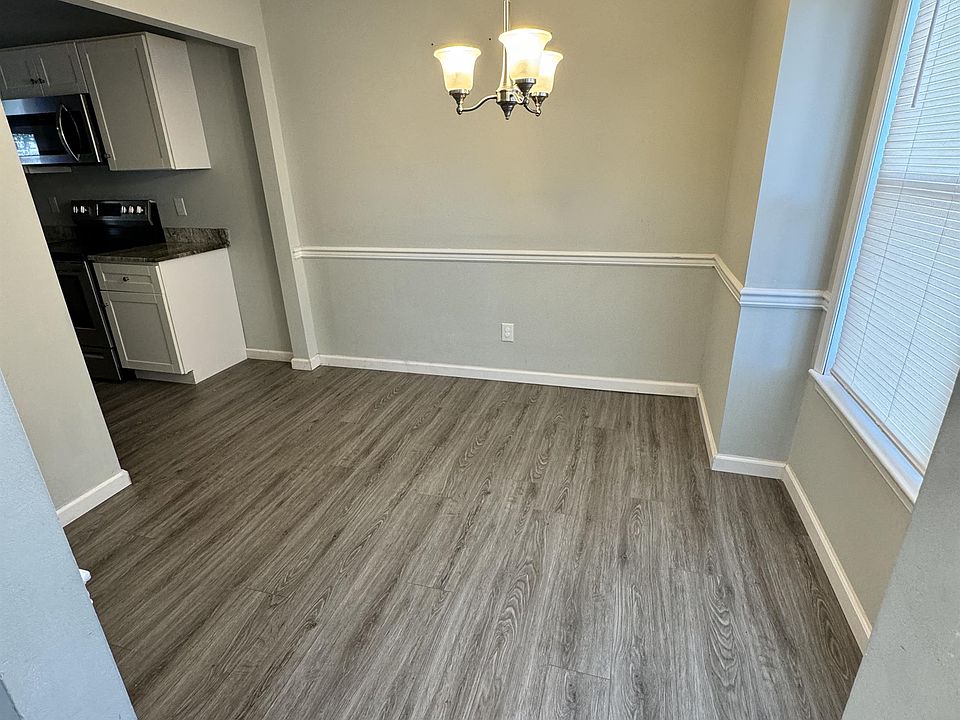 Looking into the formal dining room from the front hallway