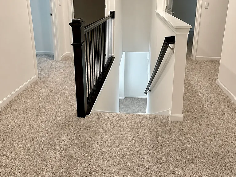 Second floor: master bdrm on left, laundry unit, and 2 bdrms plus guest bathroom to the right