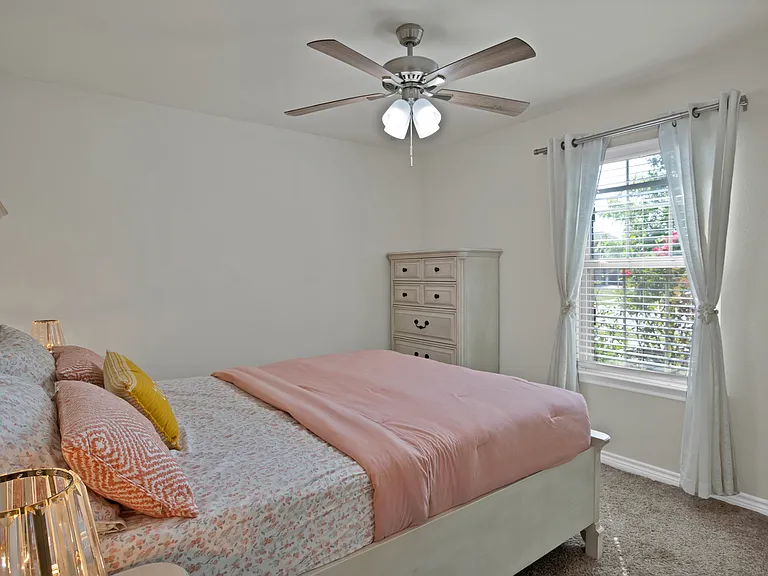 Bedroom #3 with a ceiling fan