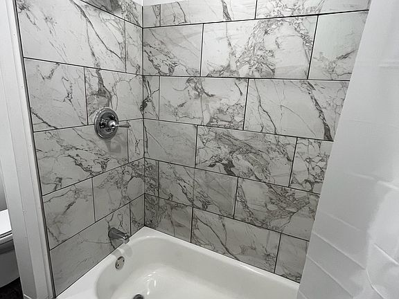 Tub surround is gorgeous