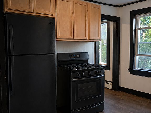 Kitchen view of the appliances. The appliances are AI rendered placeholders (for visuals) and not the actual appliances ordered. Appliances will be delivered by move-in date.