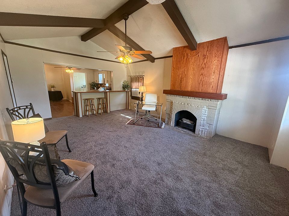 Main living areas in the home are inviting and spacious. Carpet is brand new.