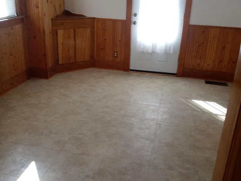 Dining Room. The door leads to the backyard deck.