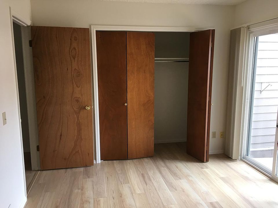 main level bedroom with outdoor patio access