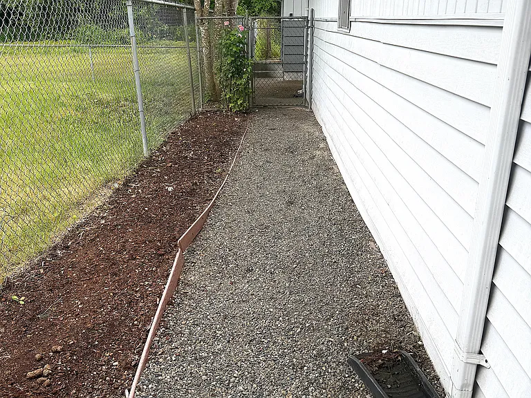Entry to fully fenced tiny home yard