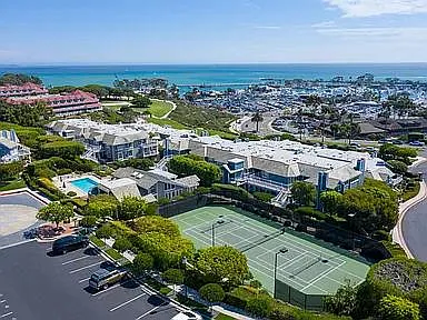 Dana Point Harbor, Laguna Cliff Marriott Hotel, community tennis and pickleball courts, recreation building with gym and saunas in both bathrooms, swimming pool and spa