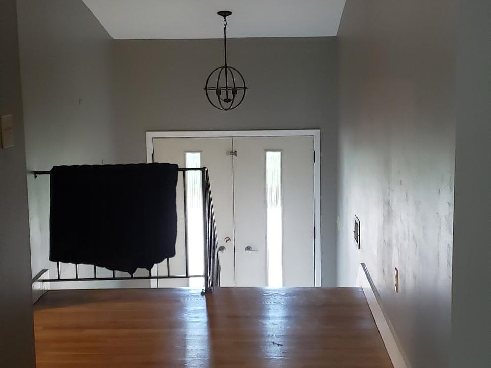 Hallway facing the front door