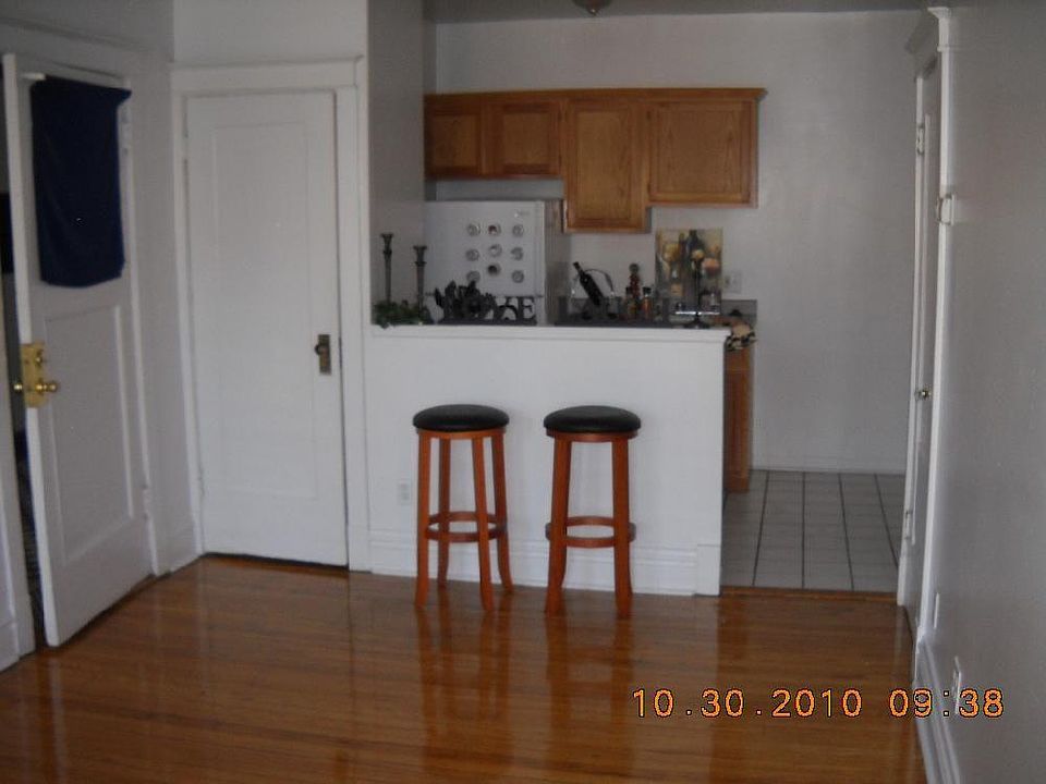 Wide view of Living/Bedroom to Kitchen with 2 closets in liv