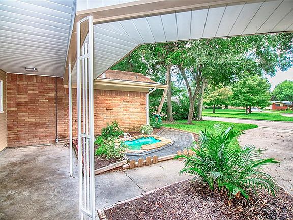 The front porch has space for seating where you can enjoy the quiet neighborhood.