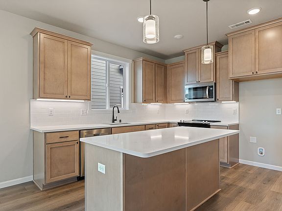 7110 S Holly ST by Aho Construction