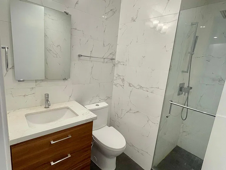 Hall Bath, shower with rain and hand shower, 3 drawers in vanity for storage