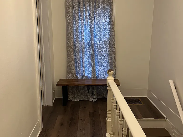 Upstairs hallway which leads to the three bedrooms.
