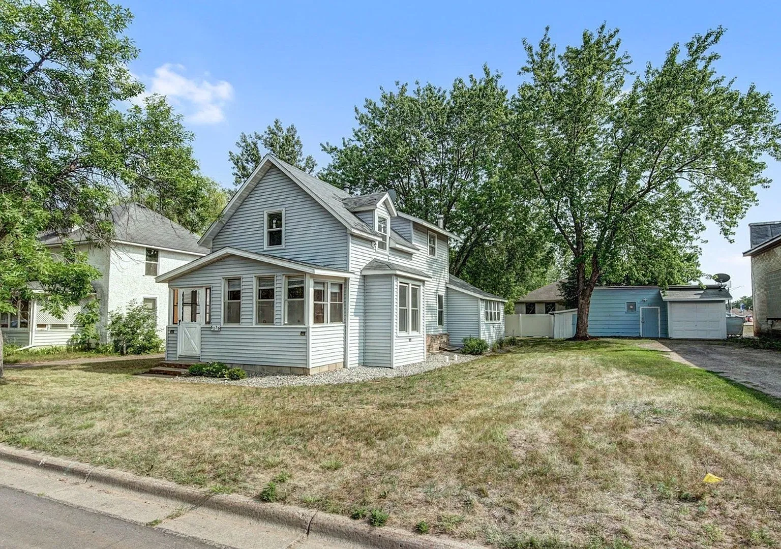 Charming Character Home with Screened Porch & Main Floor Laundry in North Branch — Photo 1