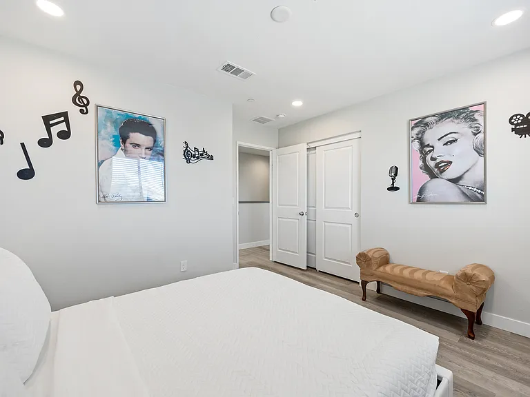 Bedroom 4 has a touch of music and features art frames of legends!