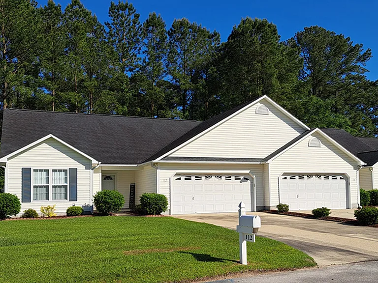 112 Tiger Woods Place. Lawn maintenance included in rent.
