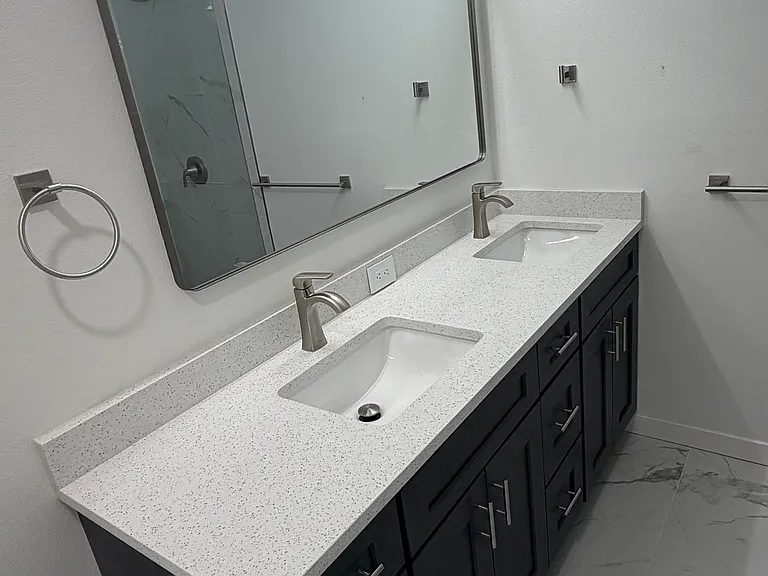 Master Bath w/ Double Sinks and Linen Shelving