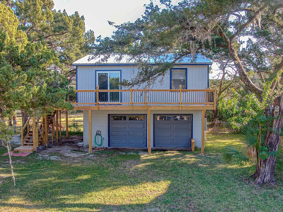 Fully renovated 2 bedroom one bath with treetop views, and wrap around deck in quiet Davis Shores Neighborhood.