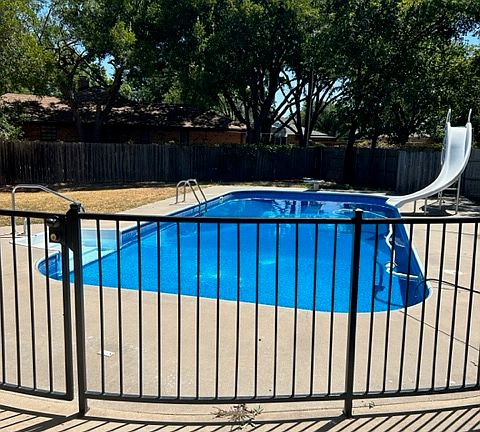 Deep pool with nice back yard