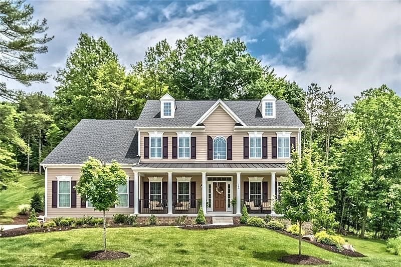 Welcome to this FABULOUS home with classic detailing, maintenance free Hardy Plank siding and exterior, beautifully landscaped l
