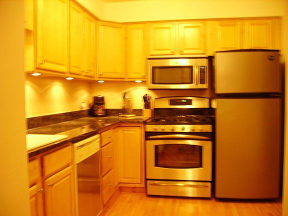 New Granite Countertop, New Stainless Steel Appliances, New Maple Cabinets