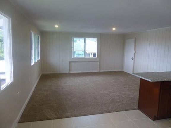 Standing in kitchen facing living room