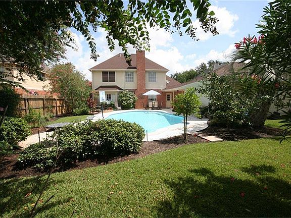 There is plenty of grassy area behind the pool for a garden or play equipment.