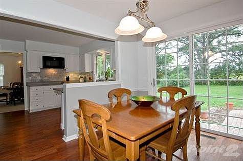 Breakfast Room w/sliders to patio and landscaped yard