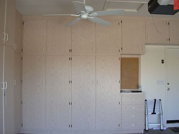 Garage w/ 3 walls of cabinets