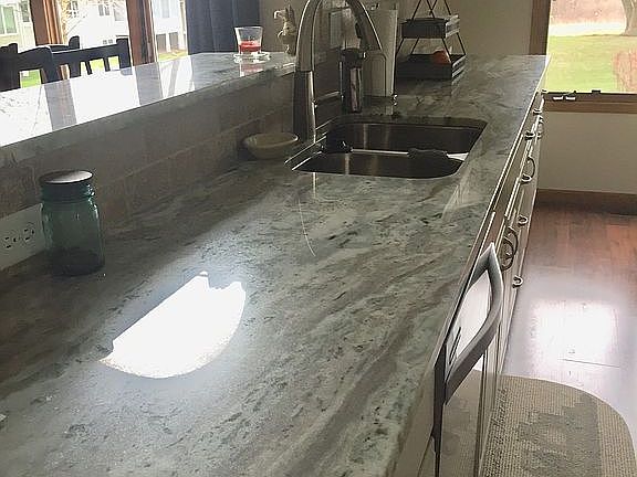 Kitchen with granite counter