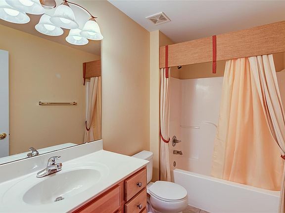 Full bathroom just off the entry foyer.
