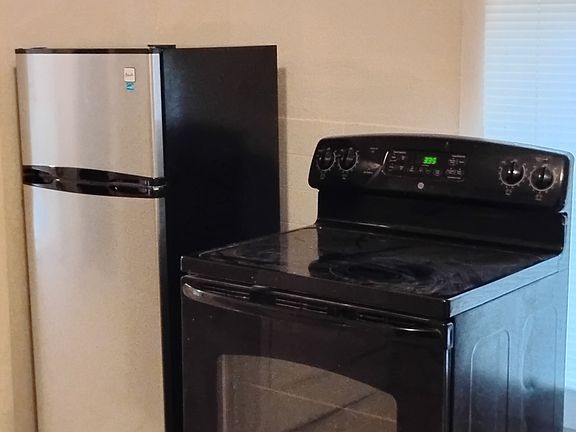 BRAND NEW REFRIGERATOR
NICE, LARGE ELECTRIC STOVE