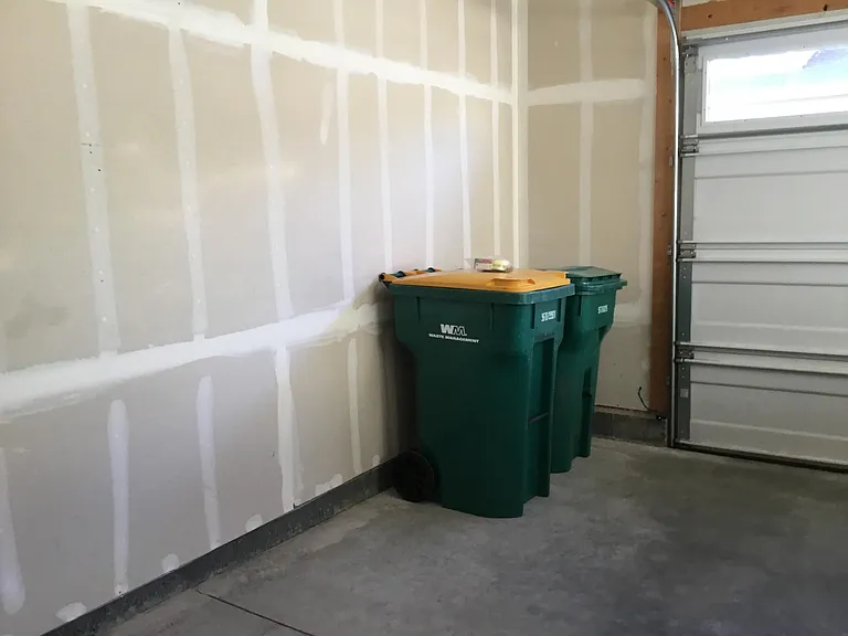 Wide 2 car garage. Weekly trash pick up included, recycle pick up every other week