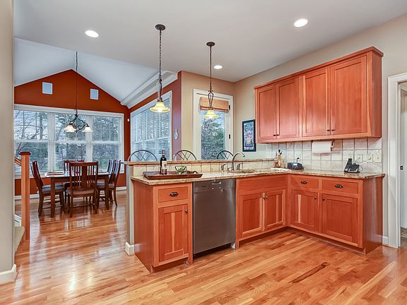 Kitchen w/ informal dining. 