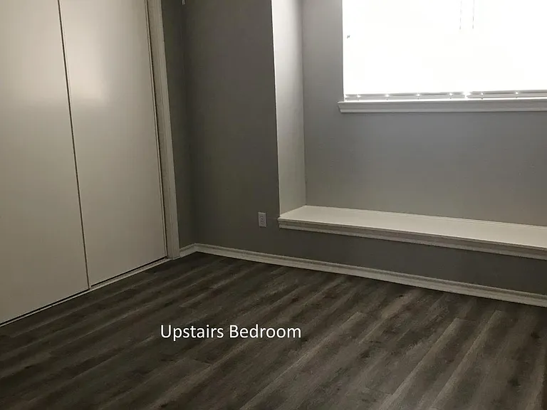 Smaller upstairs bedroom with large closet.