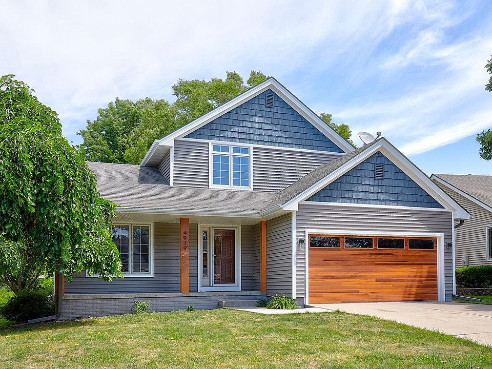 Front porch and 2 car garage